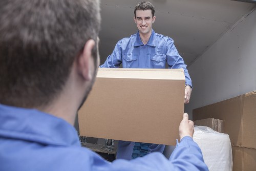 Professional movers handling household items