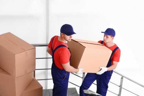 Professional movers handling office relocation in Storage Catford